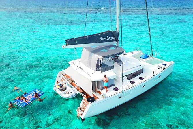 Private Catamaran to Secluded Reef & Beach Club