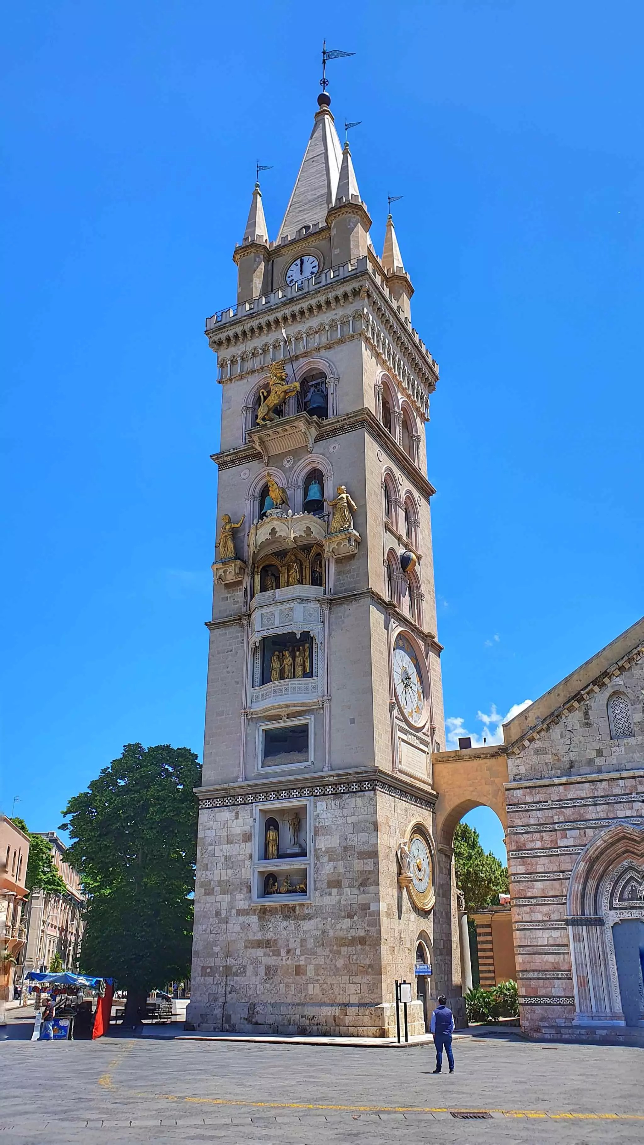 Messina Cathedral astronomical clock at noon (near-port safety net)