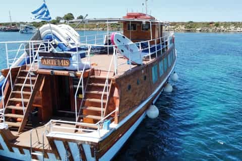 Argostoli Full-Day Traditional Wooden Boat Cruise with Swim Stops