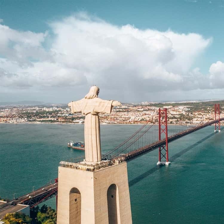 Tagus River sail past the bridge, Belem Tower & Cristo Rei