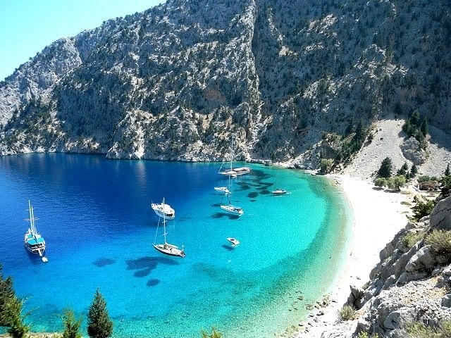 St. George's Bay: Exclusive Swim Stop on a Traditional Caïque