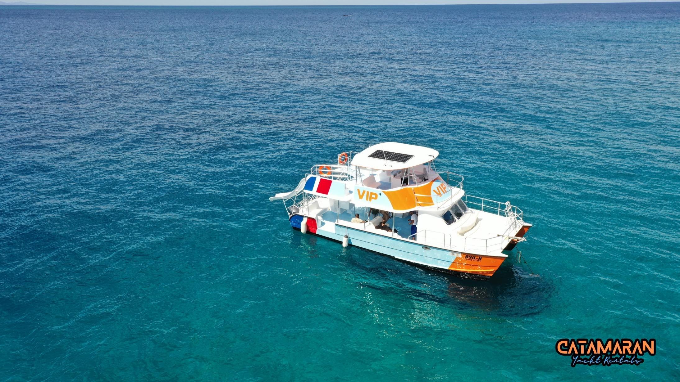 Private catamaran charter to Sosua Bay's coral reefs