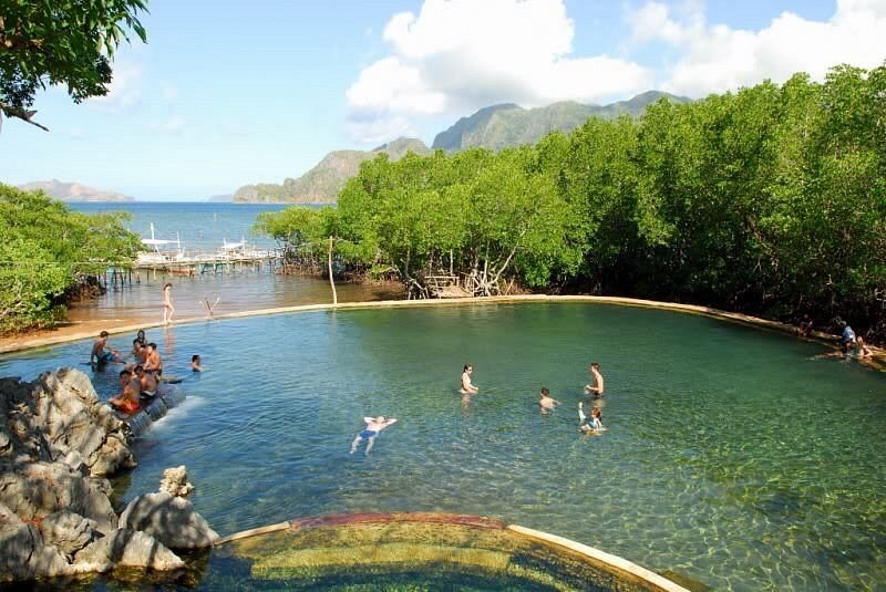 Maquinit Hot Springs: Volcanic Saltwater Soak at Dusk