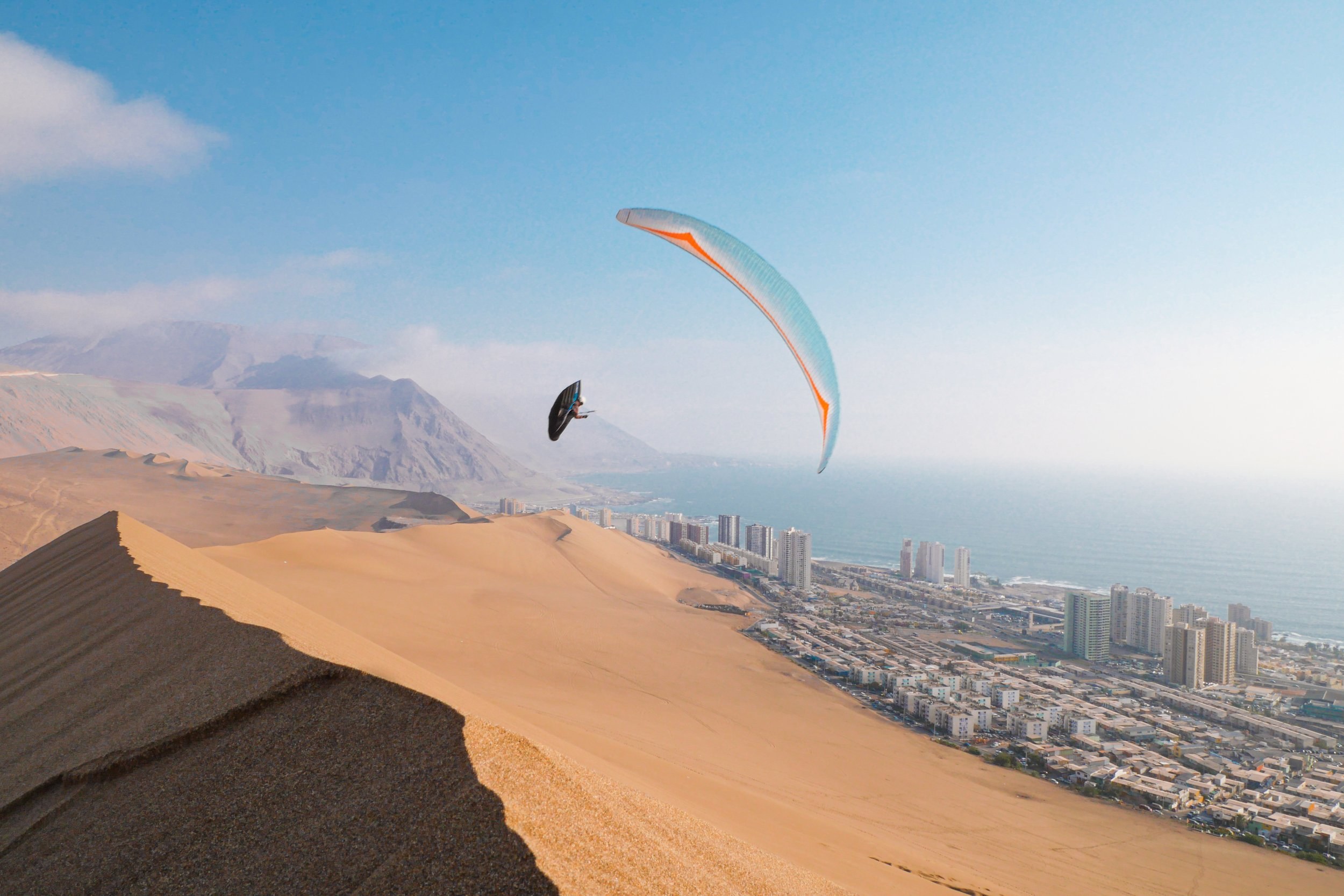 Paragliding Over Iquique: Tandem Flight from the Sea-Cliff Ridge
