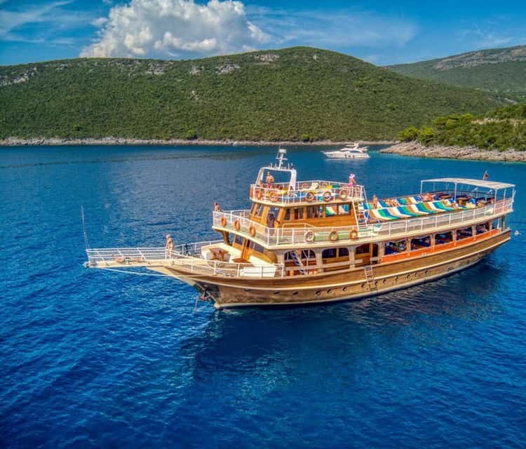 Boka Bay Full-Day Guided Luxury Cruise with Swim Stop
