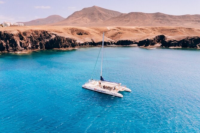 Playa de Papagayo: Private Catamaran to Lanzarote's Secluded Paradise Coves