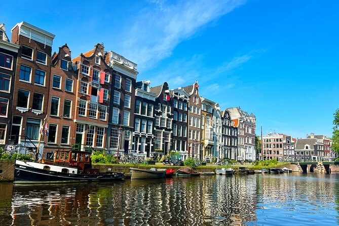 Amsterdam's Golden Age Canals: Private Guided Boat & City Tour