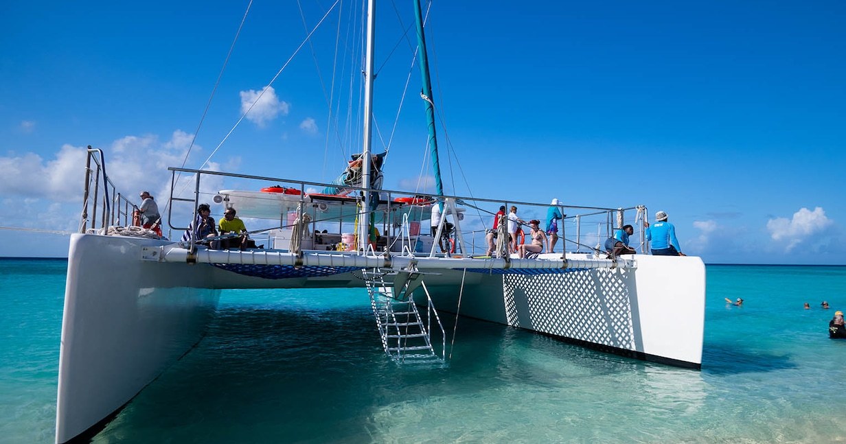 Private Catamaran Sail & Snorkel to Secluded Reefs