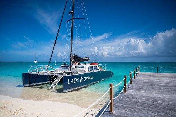 Luxury Catamaran Sail to Secluded Reef: Snorkel & Champagne