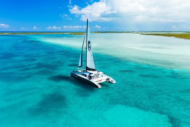 Luxury Private Catamaran Sail, Snorkel & Secluded Cove Picnic